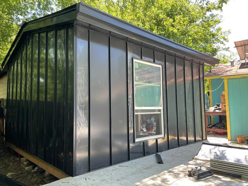 Black standing seam metal wall panels for Metal Roof Installation in Sallisaw